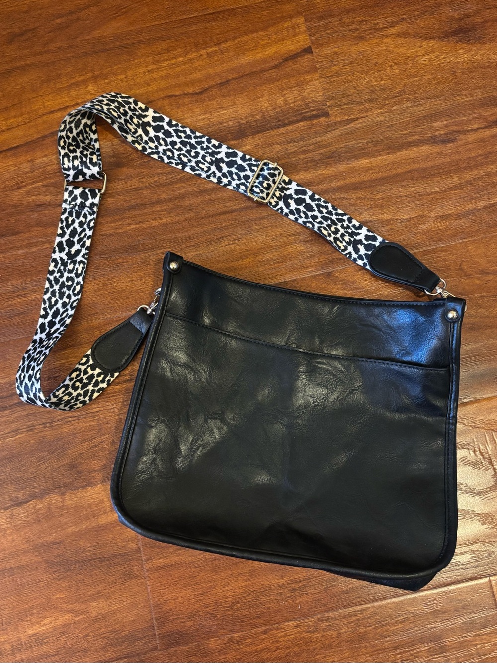 Black Leather Crossbody Bag with Leopard Strap